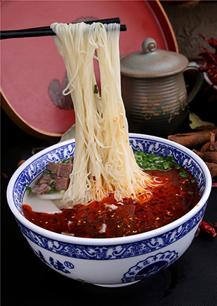 ţ